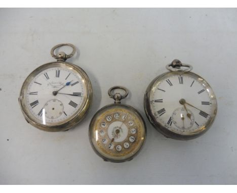 Three silver pocket watches.
