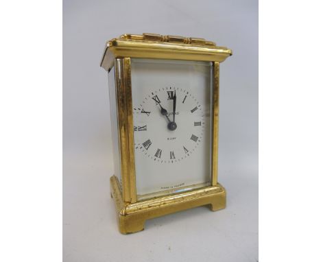A French brass carriage clock with eight day movement. 