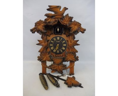 A large cuckoo clock. 