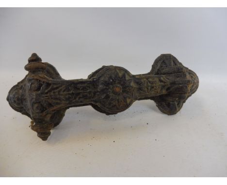 An Arts and Crafts cast iron door knocker stamped Kenrick &amp; Sons 423.