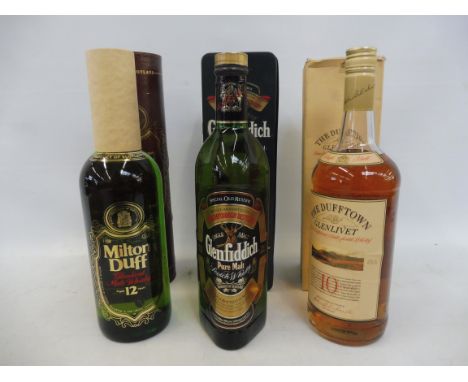 A bottle of Milton Duff 12 year old Glenlivet Malt Whisky, a 10 year old Dufftown Glenlivet and a bottle of Glenfiddich Scotc