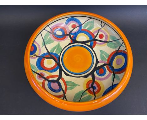 A Clarice Cliff for Wilkinson 'Circle Tree' patterned circular shallow bowl, Fantasque printed mask, 11 1/4" diameter, old la