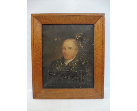 A Georgian oil portrait bust of a gentleman in a burr maple frame. 