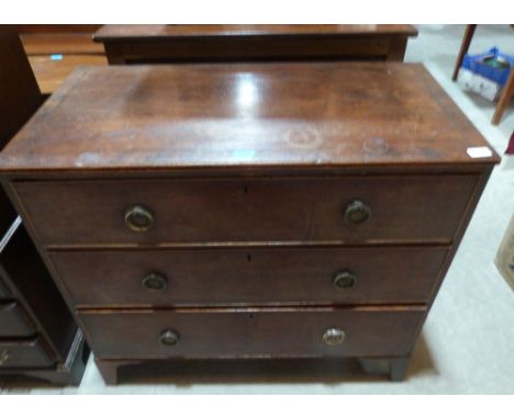A George III mahogany chest, the line inlaid top over three long graduated drawers raised on bracket feet. 36' wide