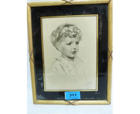 FRANK SAMUEL EASTMAN. BRITISH 1878-1964 A portrait of a young boy. Signed and dated 1934. Pencil with white heightening. 7' x