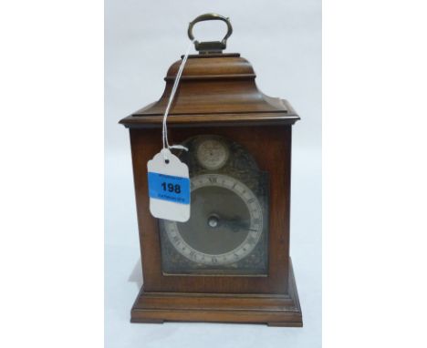 A mahogany bracket style clock of recent manufacture, the brass dial with spandrels and silvered chapter. 9'' high. Movement 