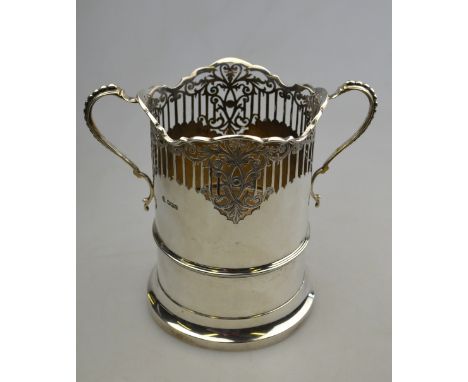 A cylindrical silver siphon stand with pierced top and twin handles, William Hutton & Sons Ltd, Sheffield, 1922, 17.4 oz