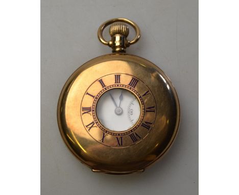 A 9ct gold half hunter pocket watch with Swiss 15-jewel top-wind movement, enamel dial and Dennison case, Birmingham 1922 Con
