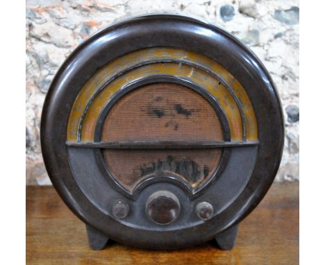 An Ekco all electric radio in circular bakelite case, type A C 76 Supernet 40 cm high Condition Report case in good original 