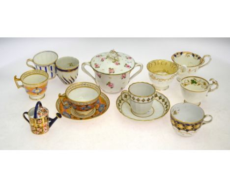 A Derby cup and saucer, decorated with a lozenge band design; together with a Derby bowl and cover, six English cups, an Engl