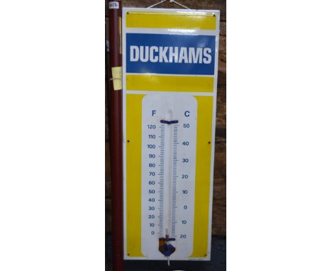 An enamel Duckhams advertising sign (lacks original thermometer), 91 x 33 cm