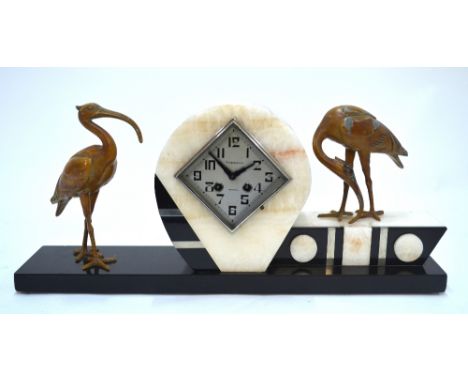 Vandeplanche, Tourgoing, an Art Deco slate and onyx eight-day mantel clock, the two train movement with diamond form silvered