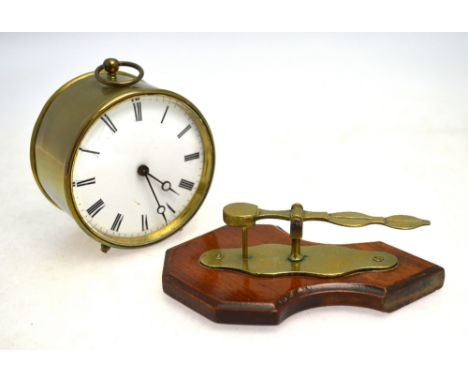A 19th century Continental brass drum cased desk clock with enamel dial, 9.5 cm, to/w a set of brass sovereign scales on oak 