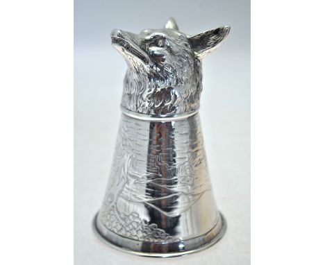 A silver stirrup cup with chased fox's head foot, the flared body engraved with a 17th century fox-hunting scene with man and