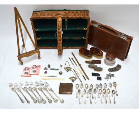 A small leather attache case containing gentlemen's collectables, including a gold-mounted snakeskin wallet, brooches, badges