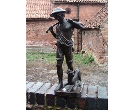 A bronze figure 'dog and boy' signed K.K.Hofu
