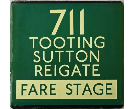 London Transport coach stop enamel E-PLATE for Green Line route 711 destinated Tooting, Sutton, Reigate 'Fare Stage'. The pla