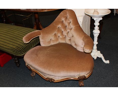 A Victorian quarter section of a gossip seat with button back and sprung seat, on short cabriole legs