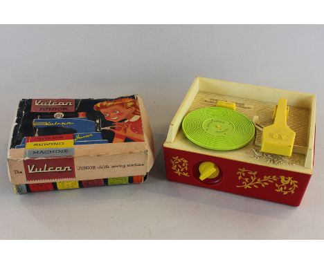 A child's Vulcan junior toy sewing machine and a child's Fisher Price toy record player