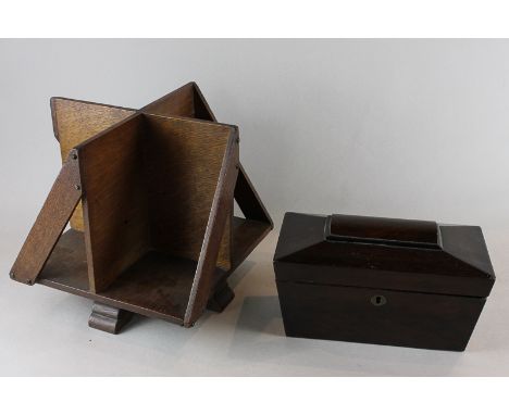 An oak table top book stand, 25cm, and a sarcophagus shaped tea caddy (a/f)