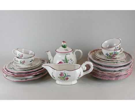 A French Luneville part dinner and tea service with a similar part dessert service, both decorated with hand painted floral 