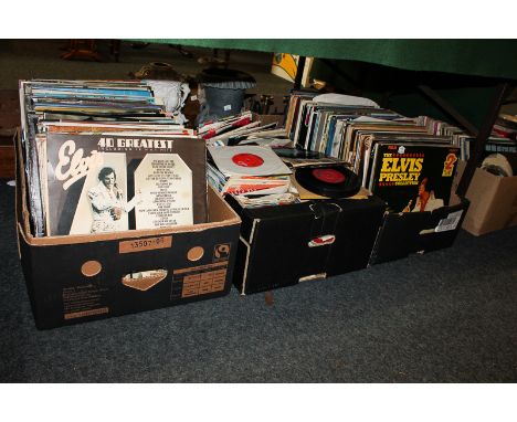 A large collection of long playing records including Elvis, Dylan, Top of the Pops compilations, housed in four boxes (approx