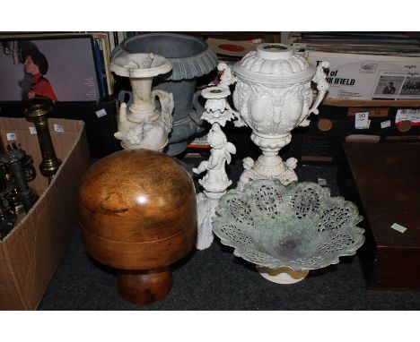 A painted spelter oil lamp base, a metal dish, a spelter figure candlestick, an alabaster urn ornament, a wooden wig stand an