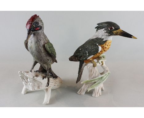 Goebel, a matt porcelain model of a green woodpecker and another of a kingfisher, perched on branches, 28cm