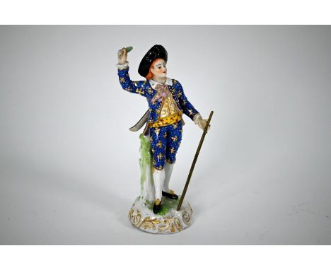 A Georgian Derby porcelain figure of a dandy minstrel, in blue and gilt breeches, a lute strapped to his back, red crowned 'D