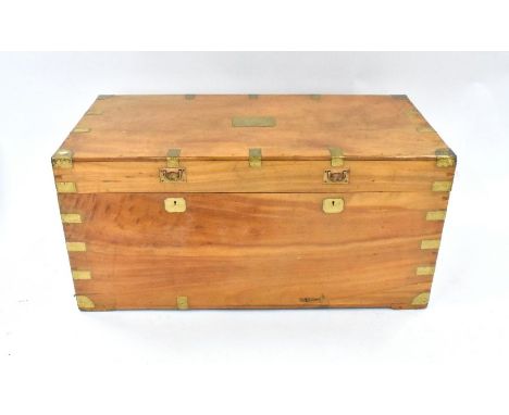 A Victorian brass bound camphorwood campaign trunk, the top with flush fitting handles, the sides with carrying handles, 117 
