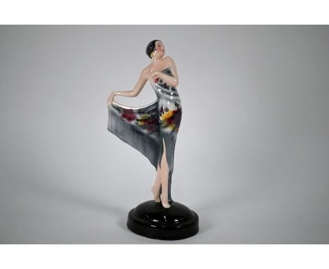 A Goldscheider pottery Art Deco figure of a female 'flapper' in fringed dress, 29 cmNo losses or damage, glaze cracks (see de