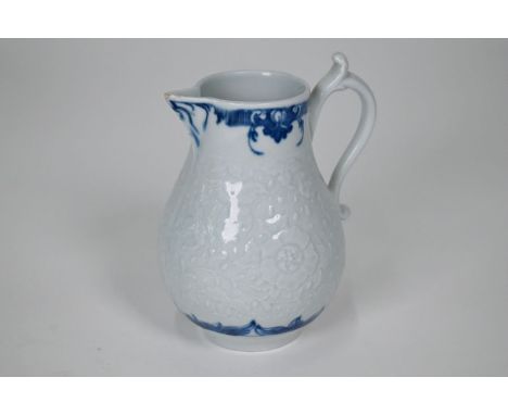 A First Period Worcester sparrow-beak jug with floral-embossed decoration between blue and white borders, 11.5 cm highSmall c