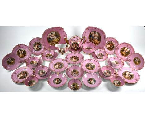 A Continental (probably Austrian) porcelain tea service, printed with courting couple and other figures, on a pink and gilt g