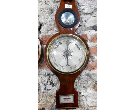 A Victorian mahogany barometer with silvered dial, thermometer, dry/damp and level centred by a small convex mirror, 98 cm&nb