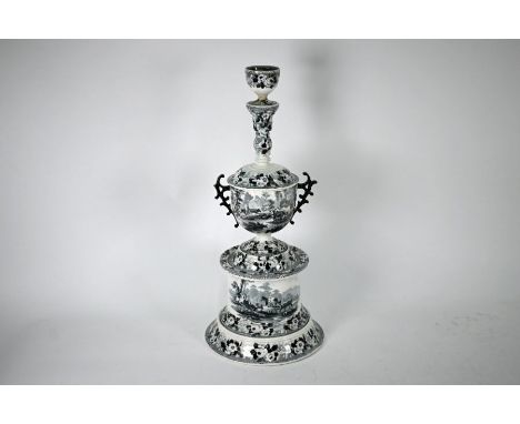 An unusual Victorian pottery seven piece smoker's companion stand, comprising tobacco jar with press and cover on stand, surm