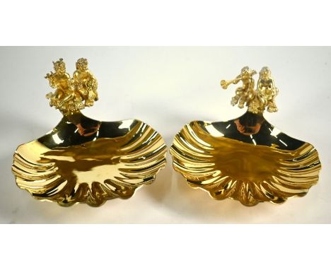 A pair of Aurum ltd Edition silver gilt shell bowls surmounted by cherubs, commemorating the births of Princes William &amp; 