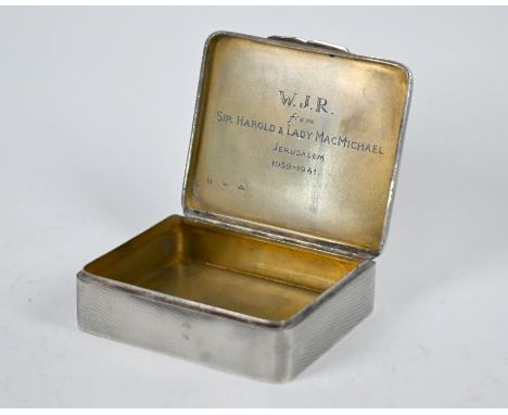 An engine-turned 900 grade snuff box, engraved inside 'W J R from Sir Harold &amp; Lady MacMichael Jerusalum 1939-41', 9 cm w