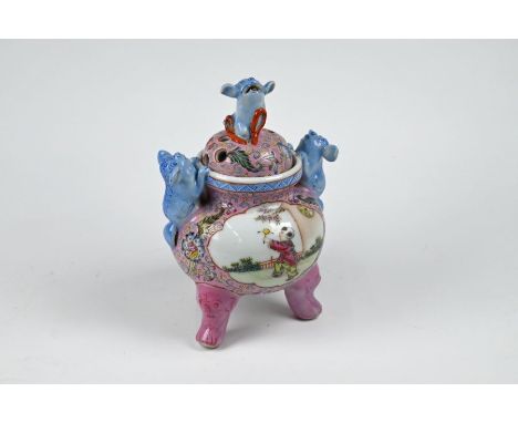 A Chinese porcelain famille rose tripod incense burner and cover with blue karashish finial and handles, the body painted in 