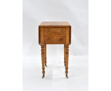 A Victorian birch drop-leaf pot cupboard, with twin dummy drawer front door, raised on turned legs to white ceramic castors, 