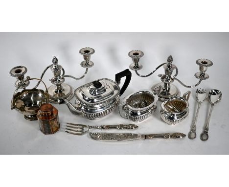 A Victorian electroplated three-piece half-reeded tea service to/w a pair of twin-branch candelabra, pair of Victorian fish-s