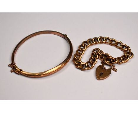 ALL PROCEEDS TO BENEFIT THE DISASTERS EMERGENCY COMMITTEE UKRAINE APPEAL
A 9ct rose gold curb bracelet with padlock and safet