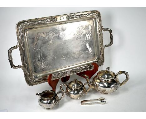 An early 20th century Chinese export silver tea service by Zee Wo of Shanghai, comprising teapot with hinged cover, 14 cm hig