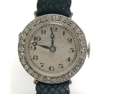 18ct white gold diamond set manual wind ladies wristwatch (20mm case) on a new plaited strap ~ running at time of listing and