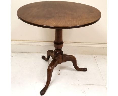 Antique oak tilt top circular occasional table on turned column on tripod base, ring marks to top, 71 cm diameter, 73 cm high