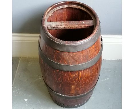 Antique oak and brass bounded barrel converted to walking stick stand 35cm wide x 27cm deep x 46cm high, in good used conditi