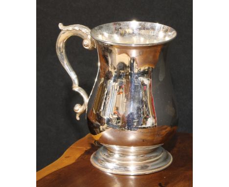 A Victorian silver bell shaped pint mug, quite plain, acanthus capped double scroll handle, domed foot, 13.5cm high, Henry Ho