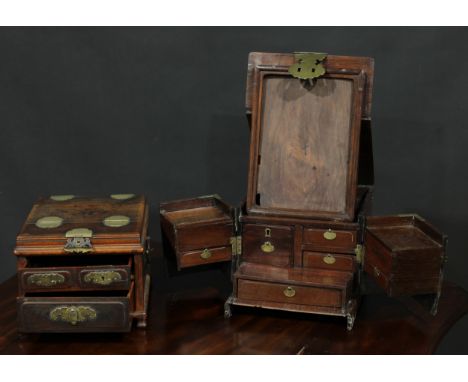 A Chinese hardwood rectangular table top vanity box, hinged cover and folding front enclosing a dressing mirror, small drawer