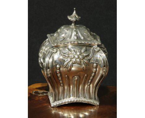 A Victorian silver bombe shaped tea caddy, of George III Rococo design, pointed knop finial, 14cm high, Hawksworth, Eyre &amp