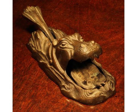 Nutcrackers - an early 20th century cast iron table top lever-action nut cracker, as a hippopotamus, 22cm long, Banksway, Rd.