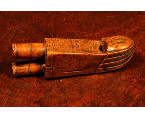Nutcrackers - a 17th century boxwood figural lever-action nut cracker, as a stylised knight, his rudimentary body punched and